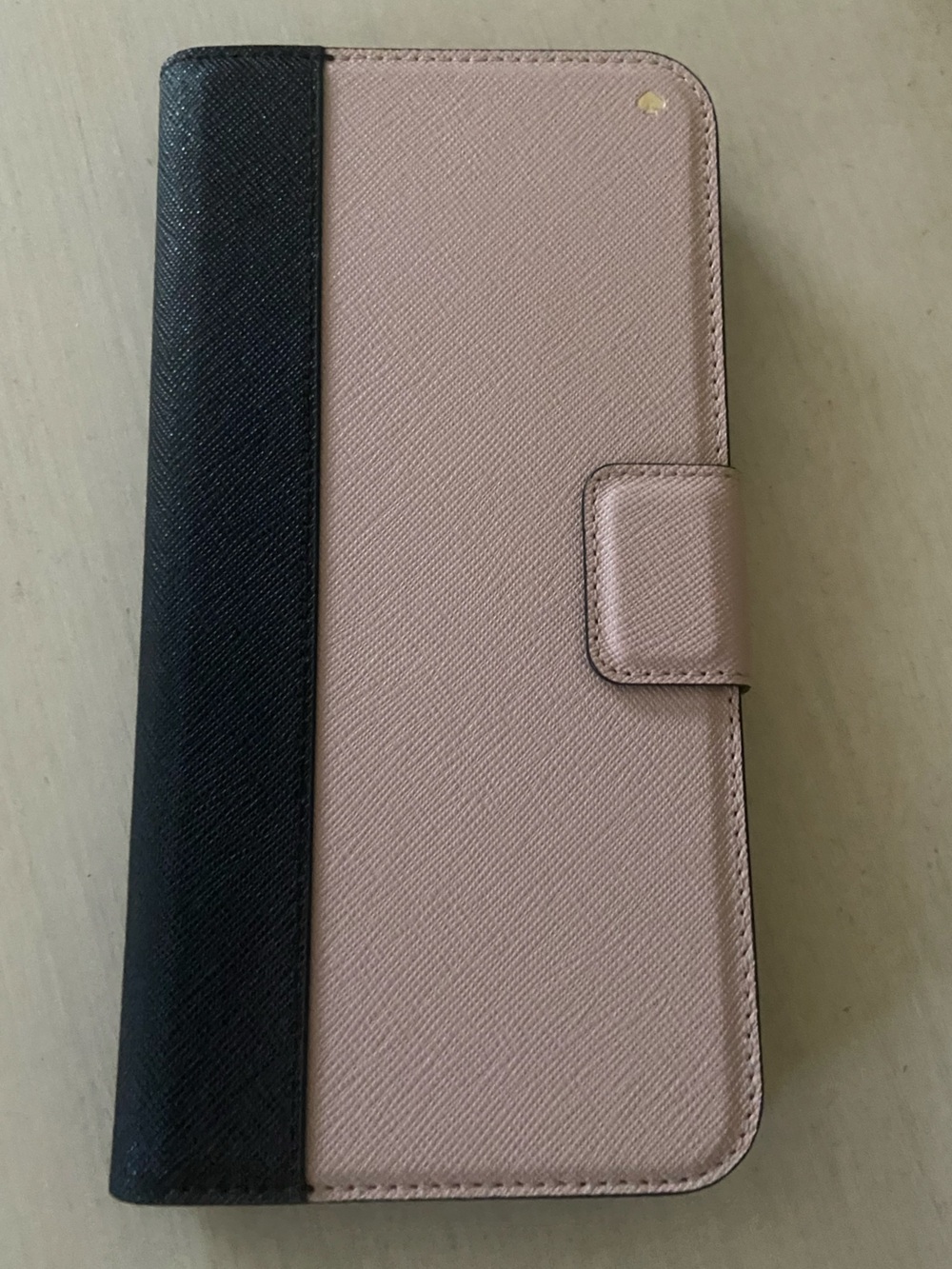 Kate Spade magnetic wrap folio case. Pink and black exterior. Black interior.
